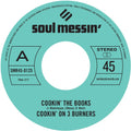 Cookin' The Books b/w Give A Little Bit More [7" Vinyl] Vinyl Record