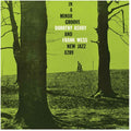 Pre-Order: In A Minor Groove [Clear With Red/Green/Purple] Vinyl Record