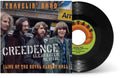 Creedence Clearwater Revival - Traveling Band [Live At The Royal Albert Hall] Who'll Stop the Rain [live at Oakland Coliseum, CA.] (7" Vinyl) (RSD Exclusive) Vinyl Record