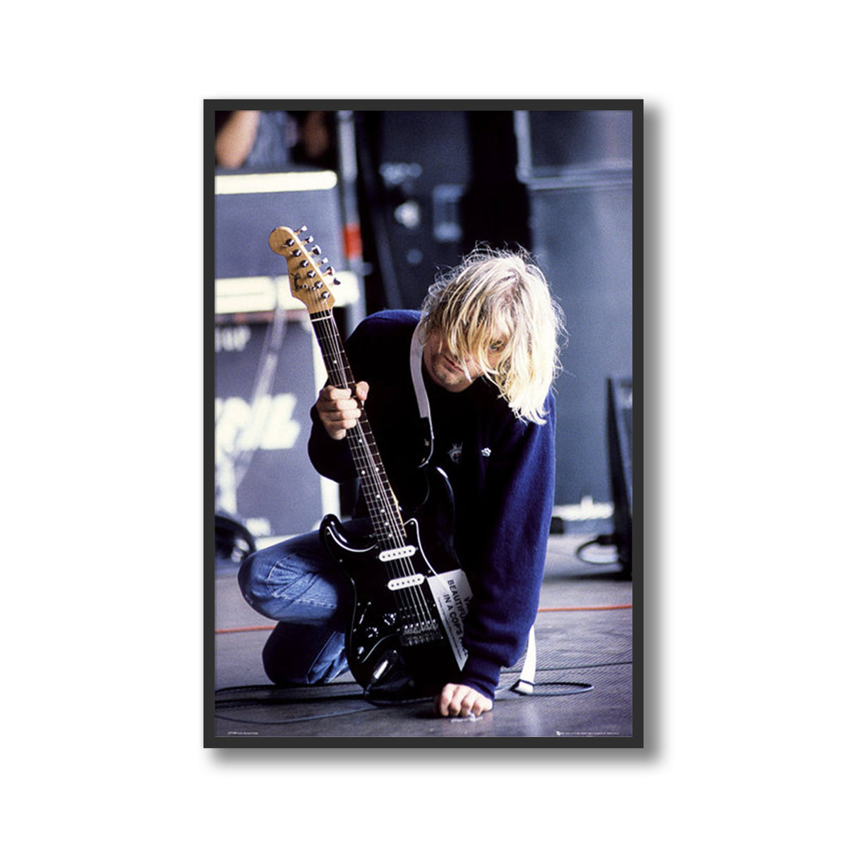 Kurt Cobain Kneeling with Guitar Framed Poster