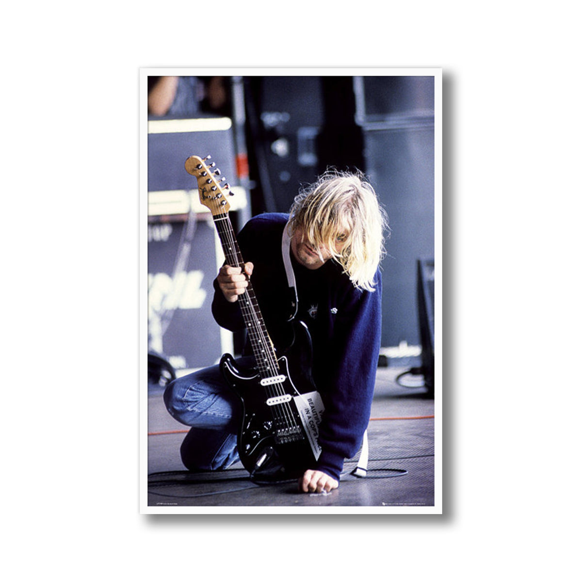 Kurt Cobain Kneeling with Guitar Framed Poster