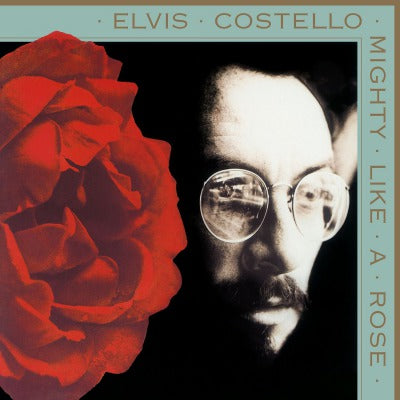 Elvis Costello Mighty Like A Rose (Limited Edition, 180 Gram Vinyl, Colored Vinyl, Gold) [Import] Vinyl Record