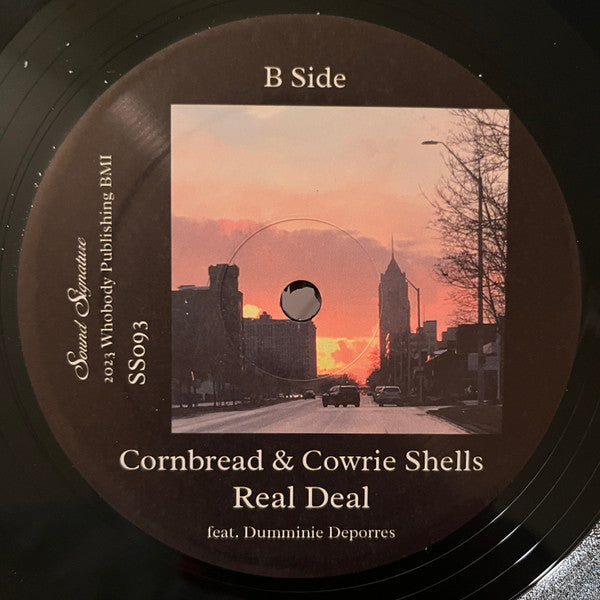Cornbread & Cowrie Shells For Bertha | Mint (M) Mint (M)