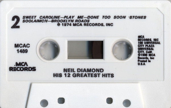His 12 Greatest Hits (CASSETTE) | Mint (M) Mint (M)